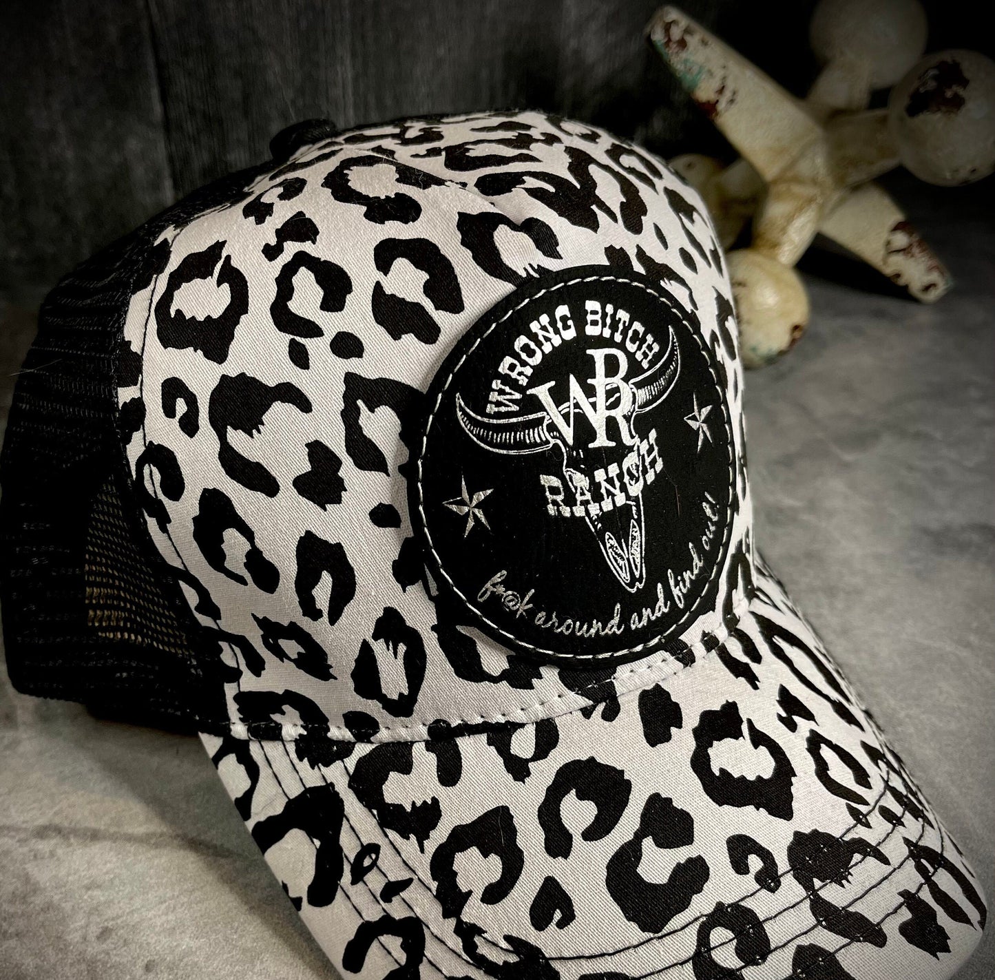 Feed Store Couture, By Joi. Wrong Bitch Ranch, fuck around & find out, womens white or brown leopard reg and ponytail trucker cap
