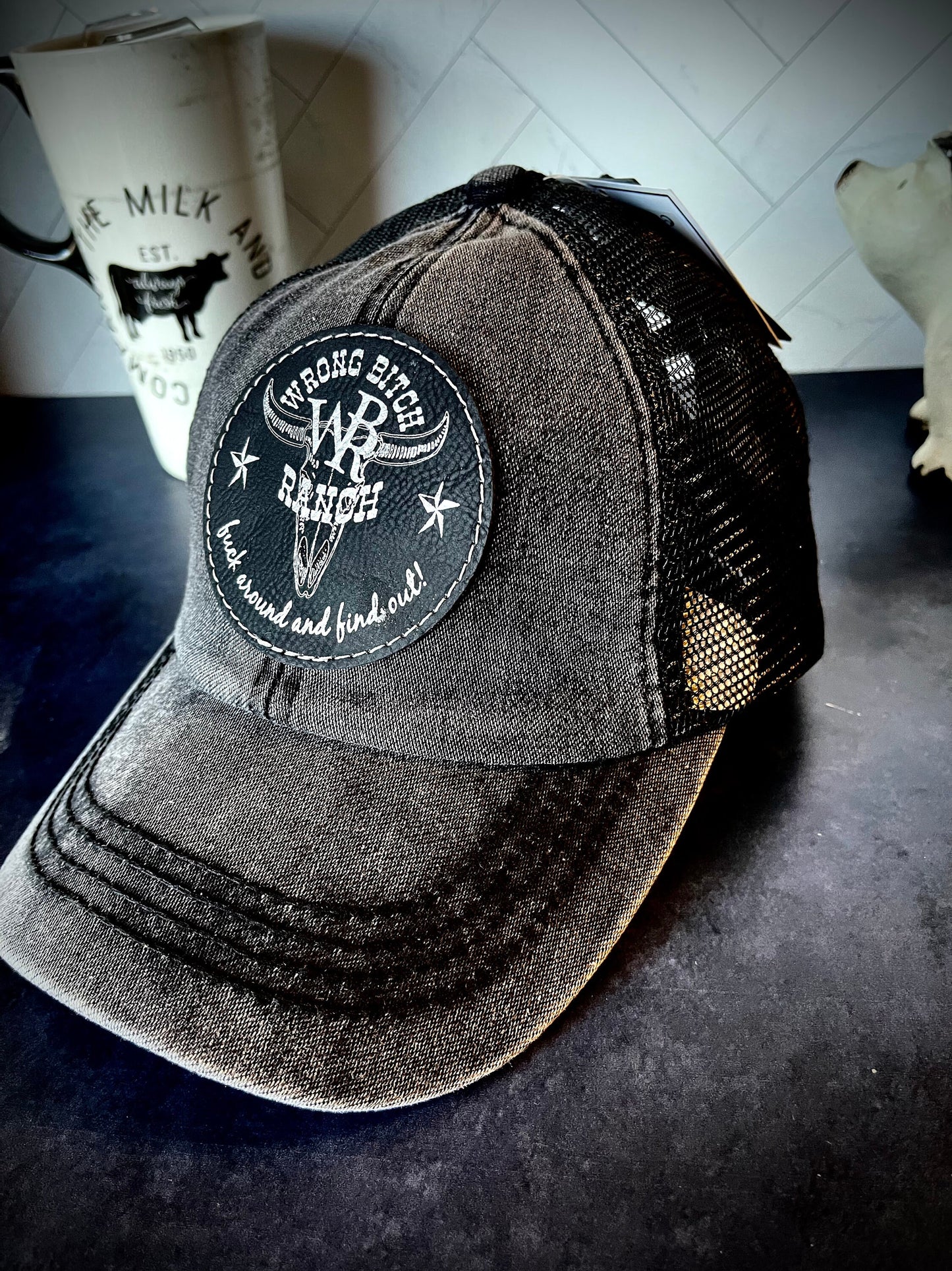 Feed Store Couture,By Joi. Wrong Bitch Ranch,f*@k around and find out C.C brand Criss cross, ponytail style acid wash black trucker style
