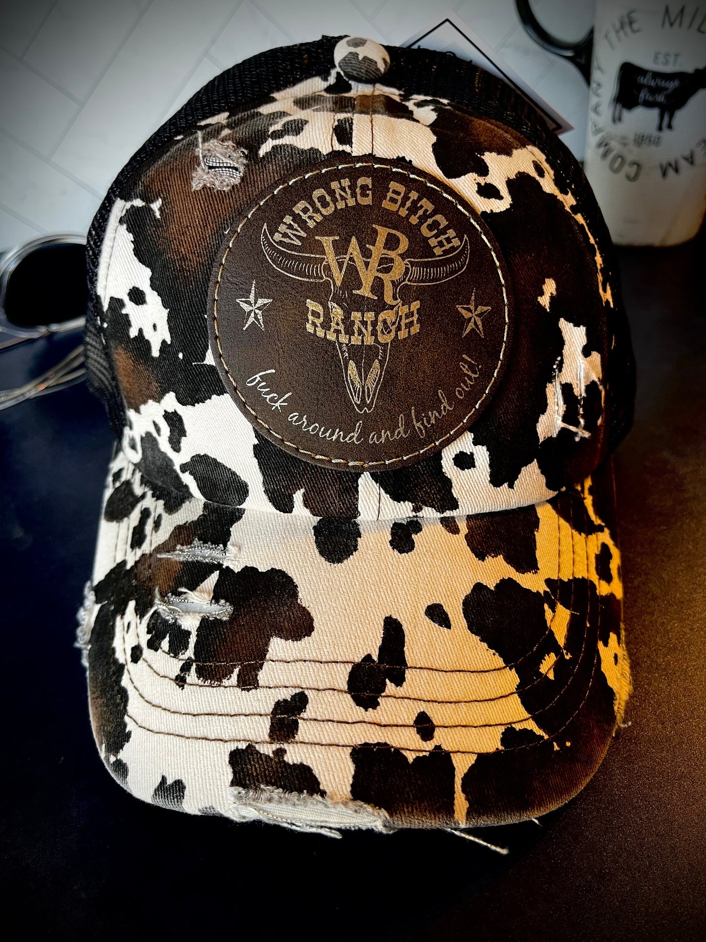 Women’s Cow Print Ponytail Trucker Hat